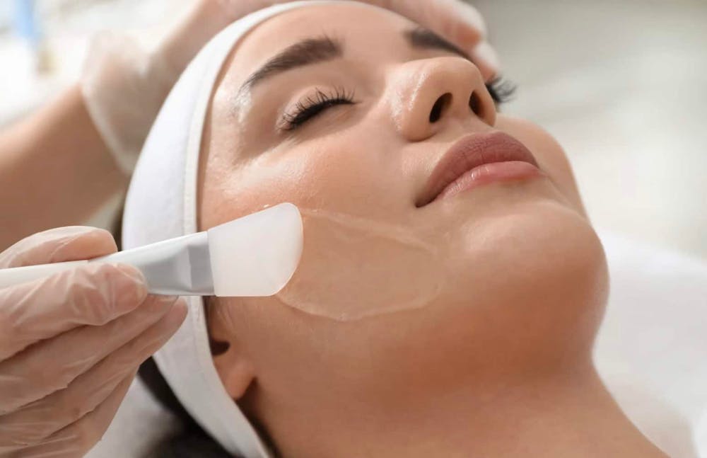 woman getting a face treatment