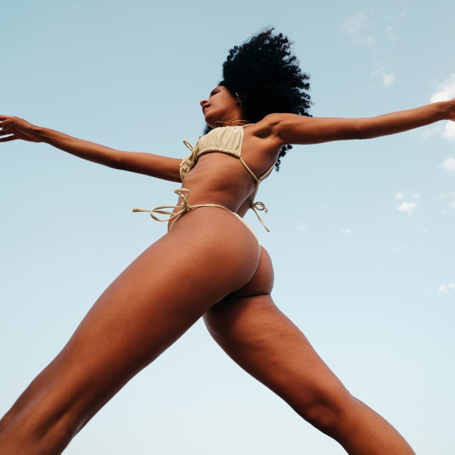 woman in a bikini walking