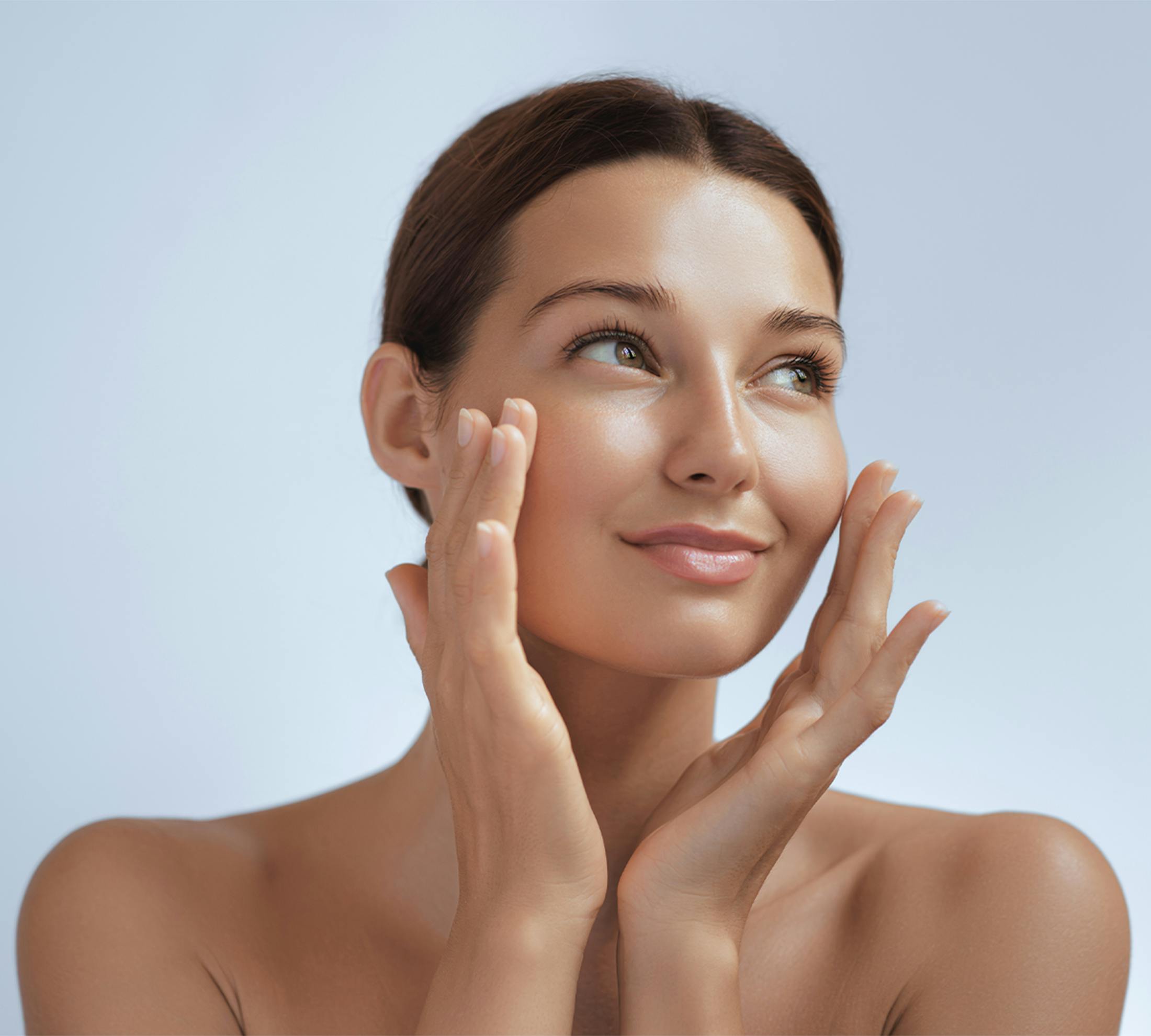 Woman touching her face