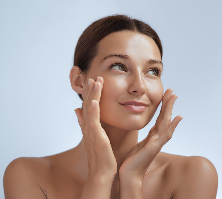 Woman touching her face