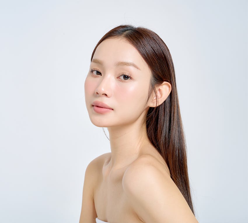 women posing with soft smile