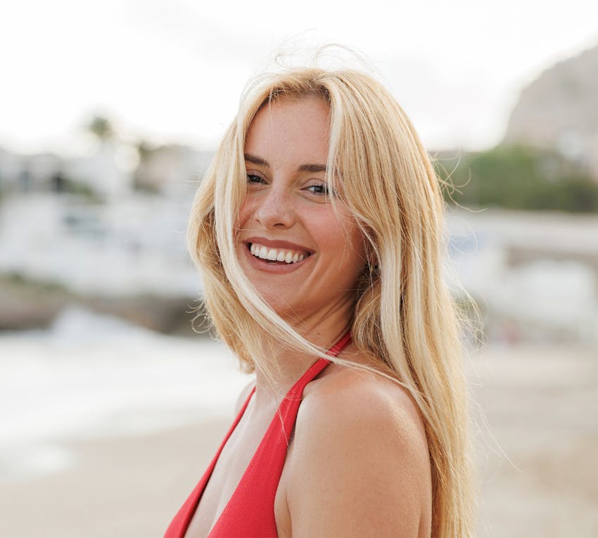 women smiling outaide