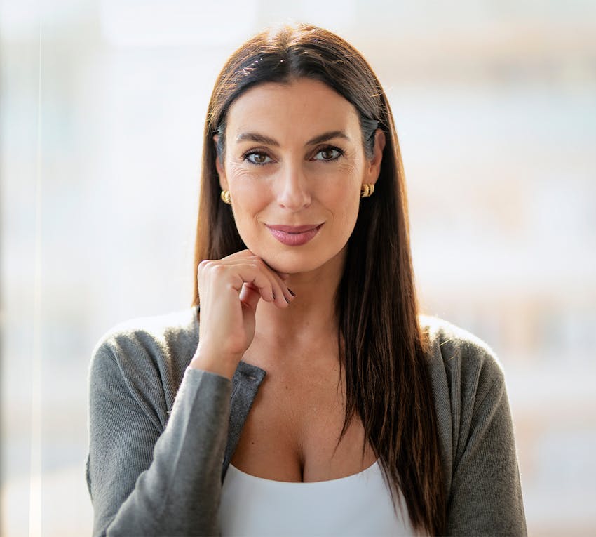 Woman touching her chin