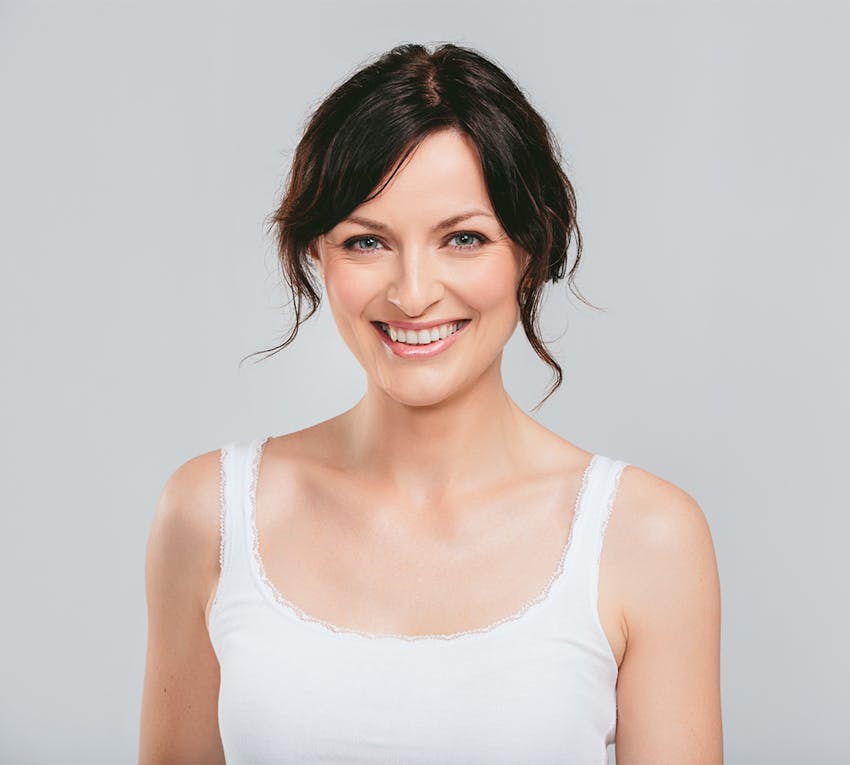 woman smiling into camera