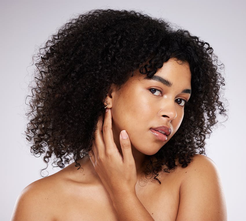 woman touching her jaw