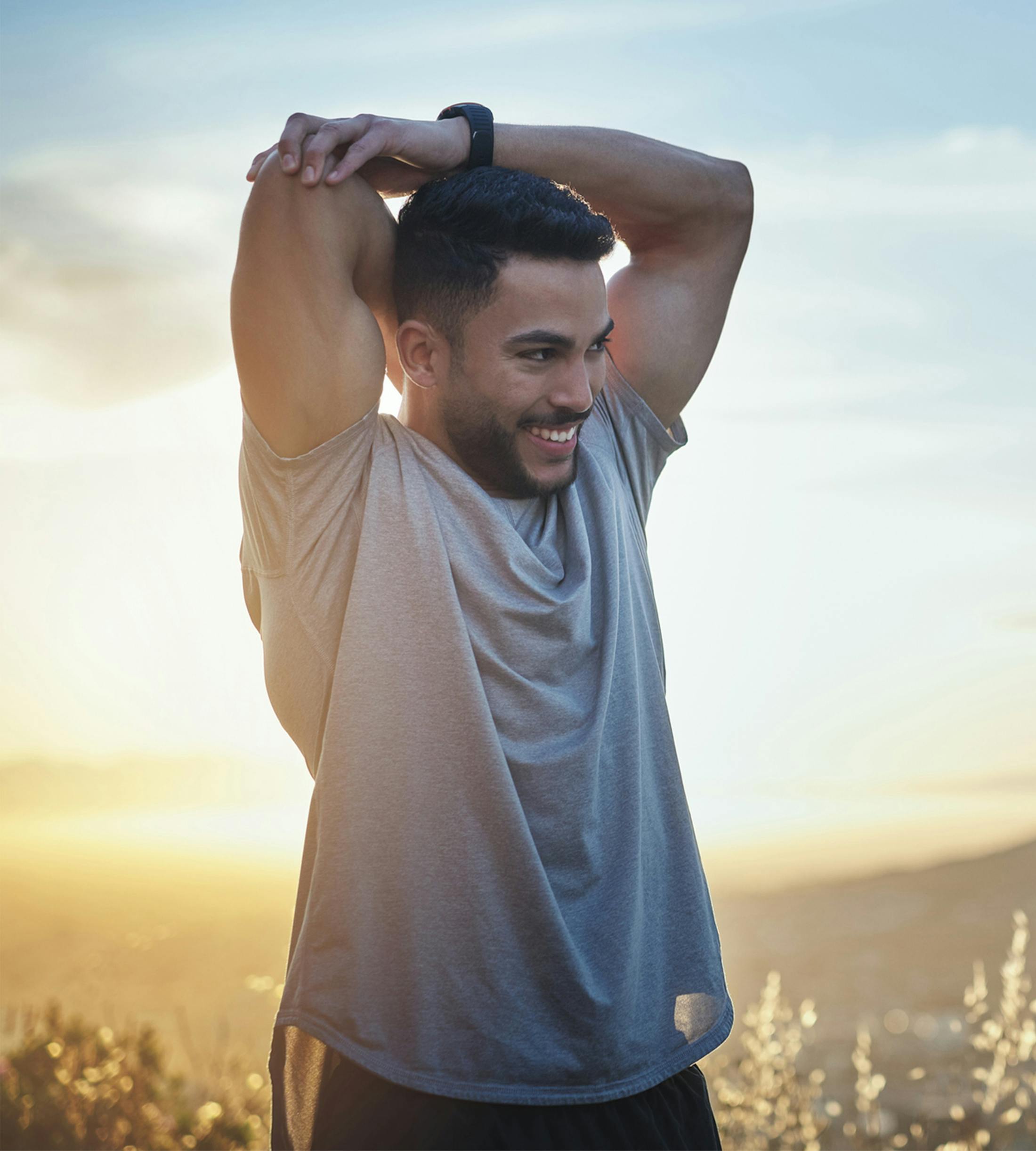 man stretching his arms