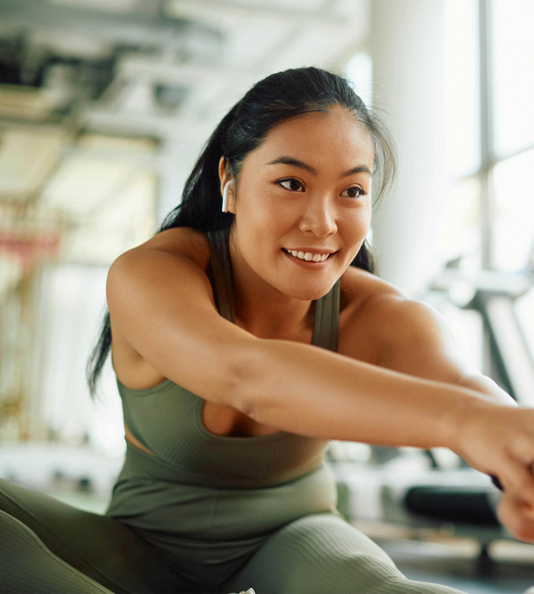 woman stretching in the gym