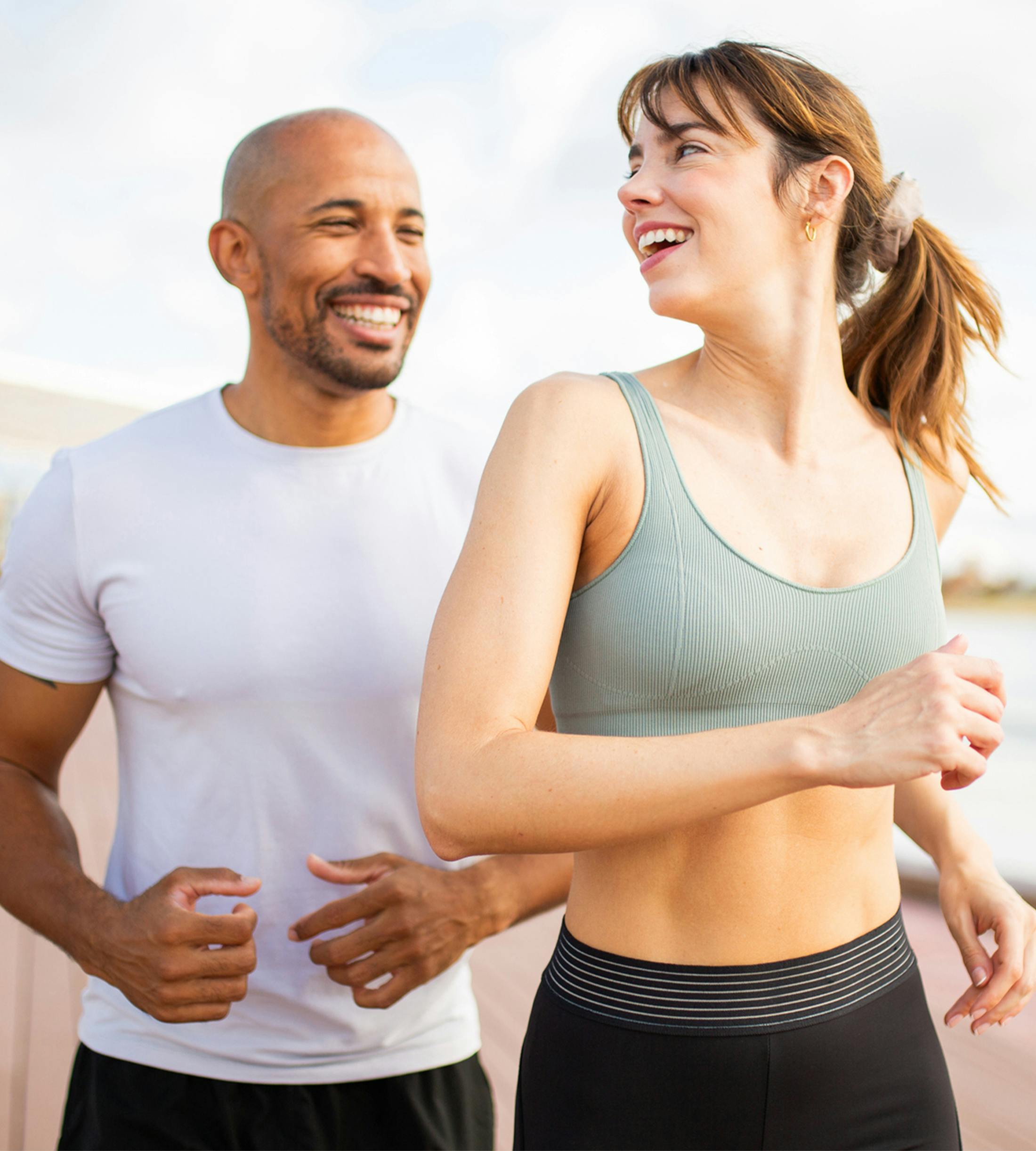 man and woman jogging