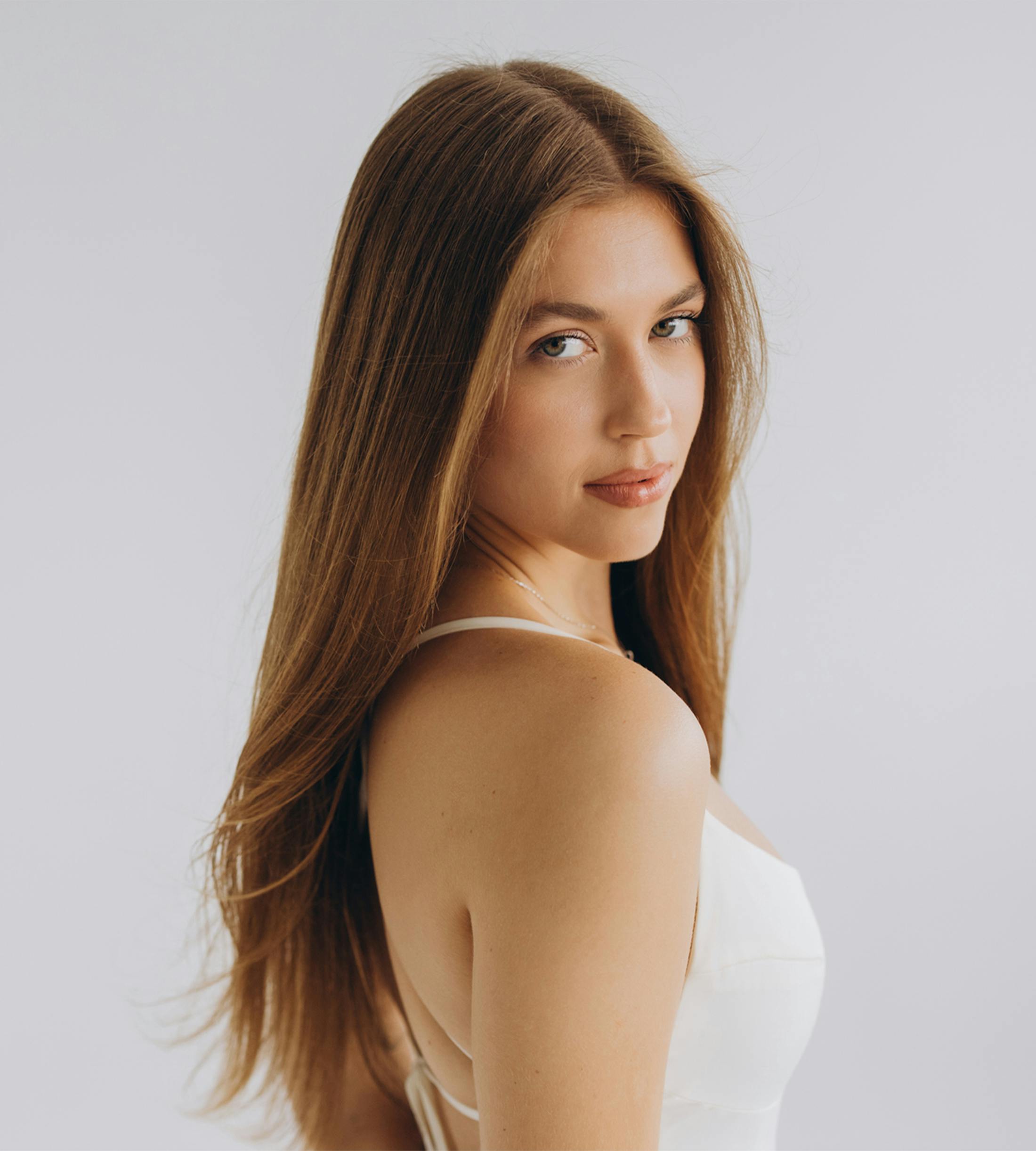 woman looking over her shoulder