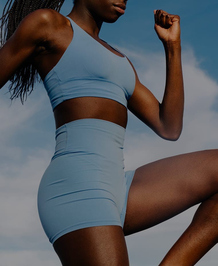 woman wearing blue workout clothes