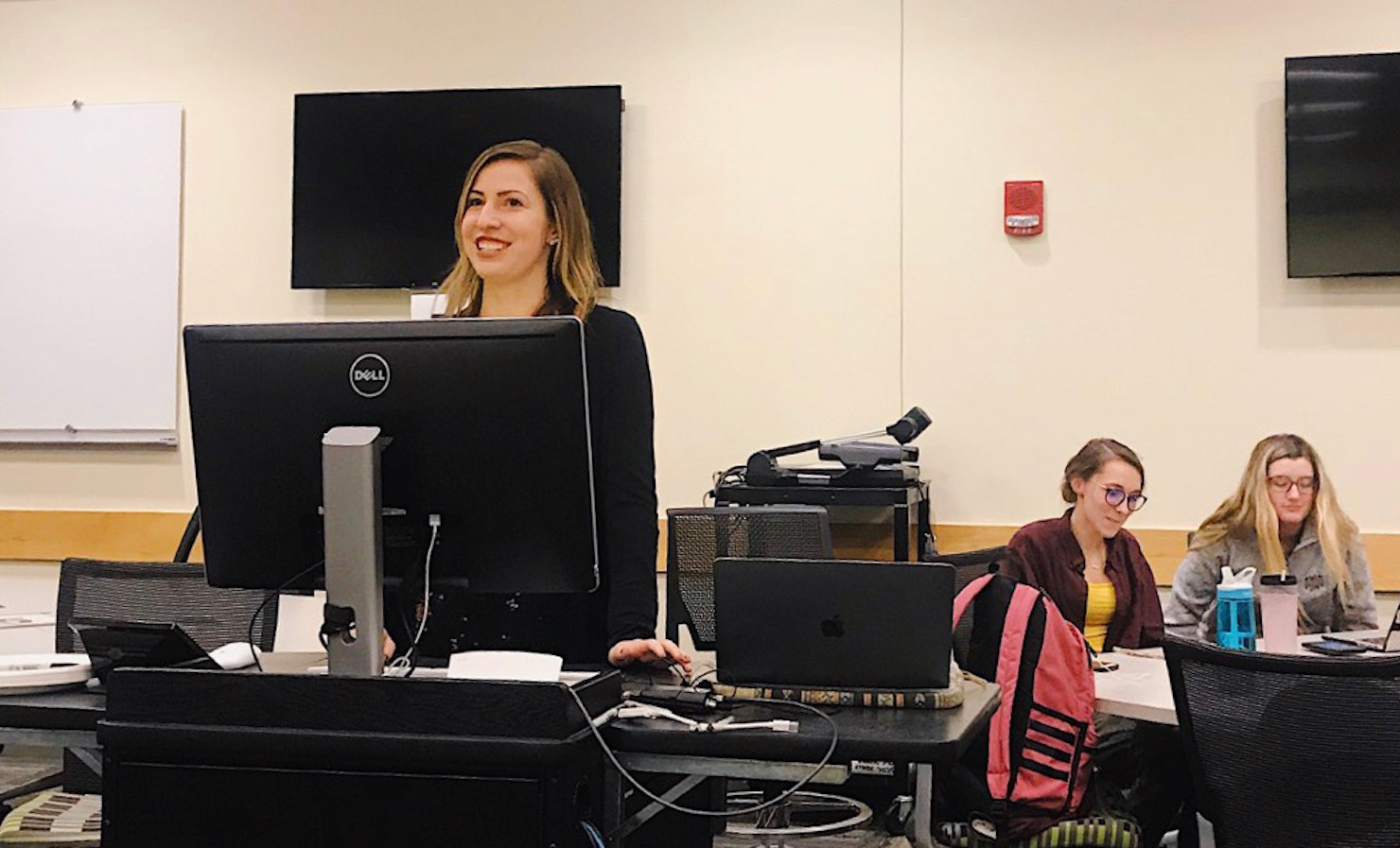 Rachel presenting in a classroom