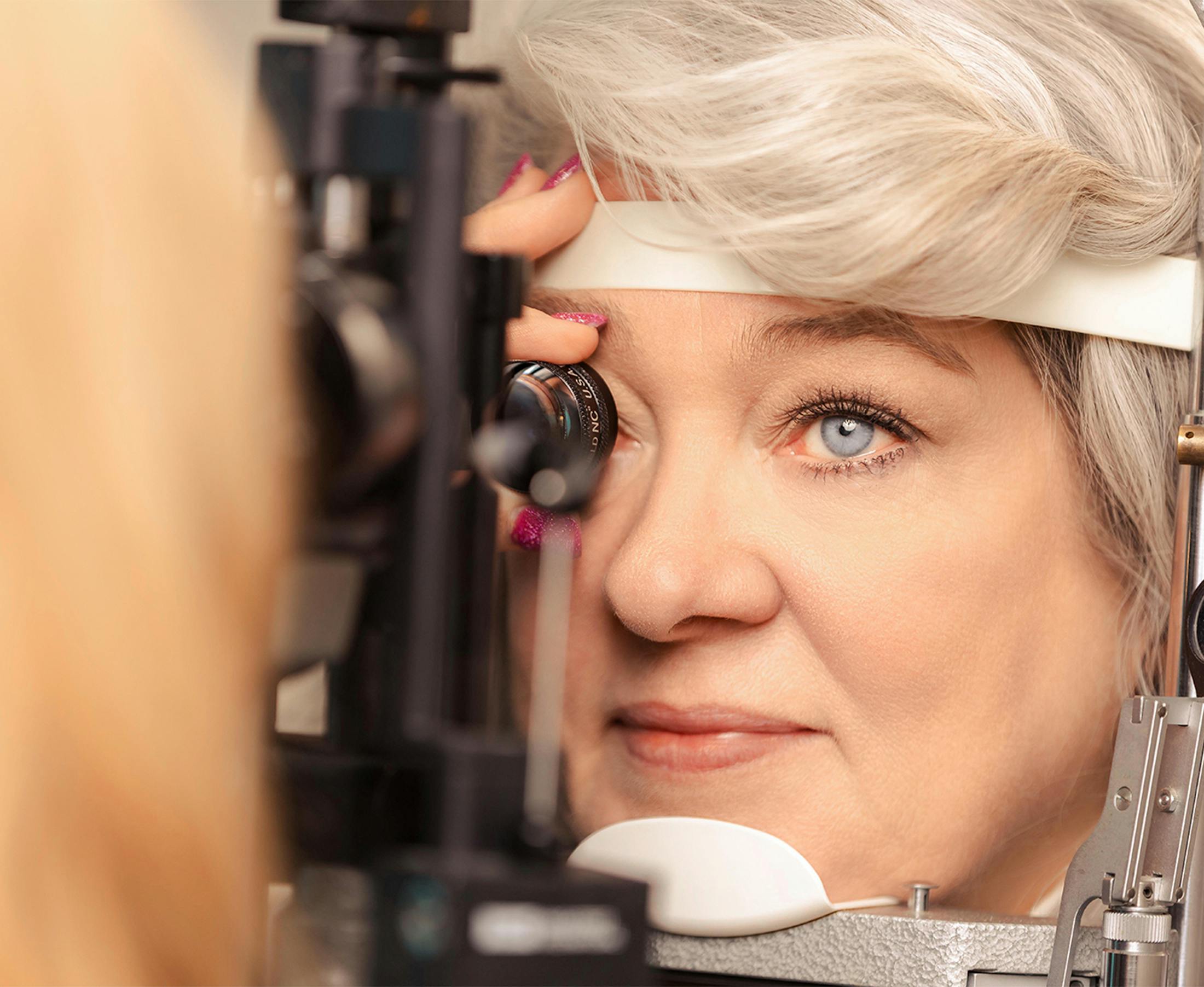 woman getting her eyes examined