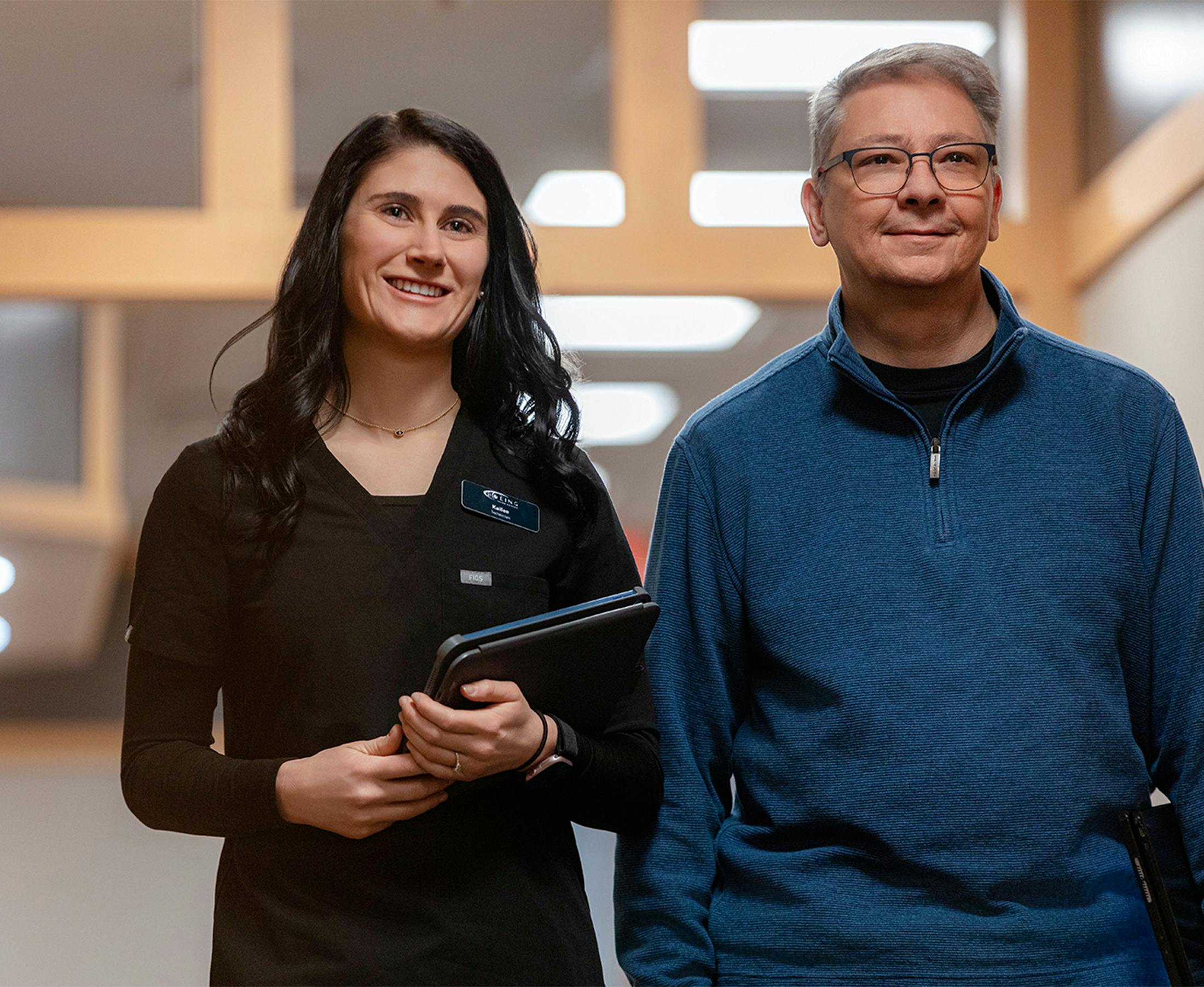 two people smiling