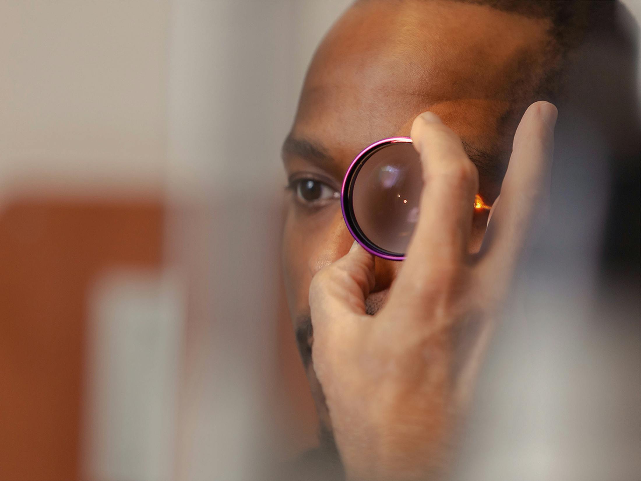 man getting his eye examined