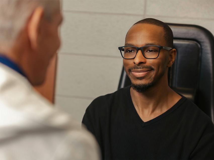 man smiling at the doctor