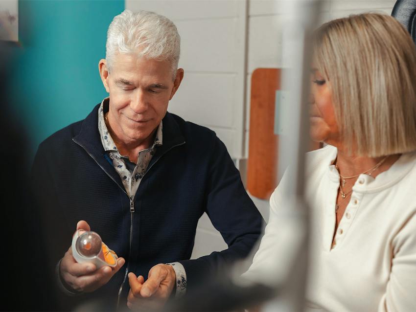 Richard Boling II with patient during consultation
