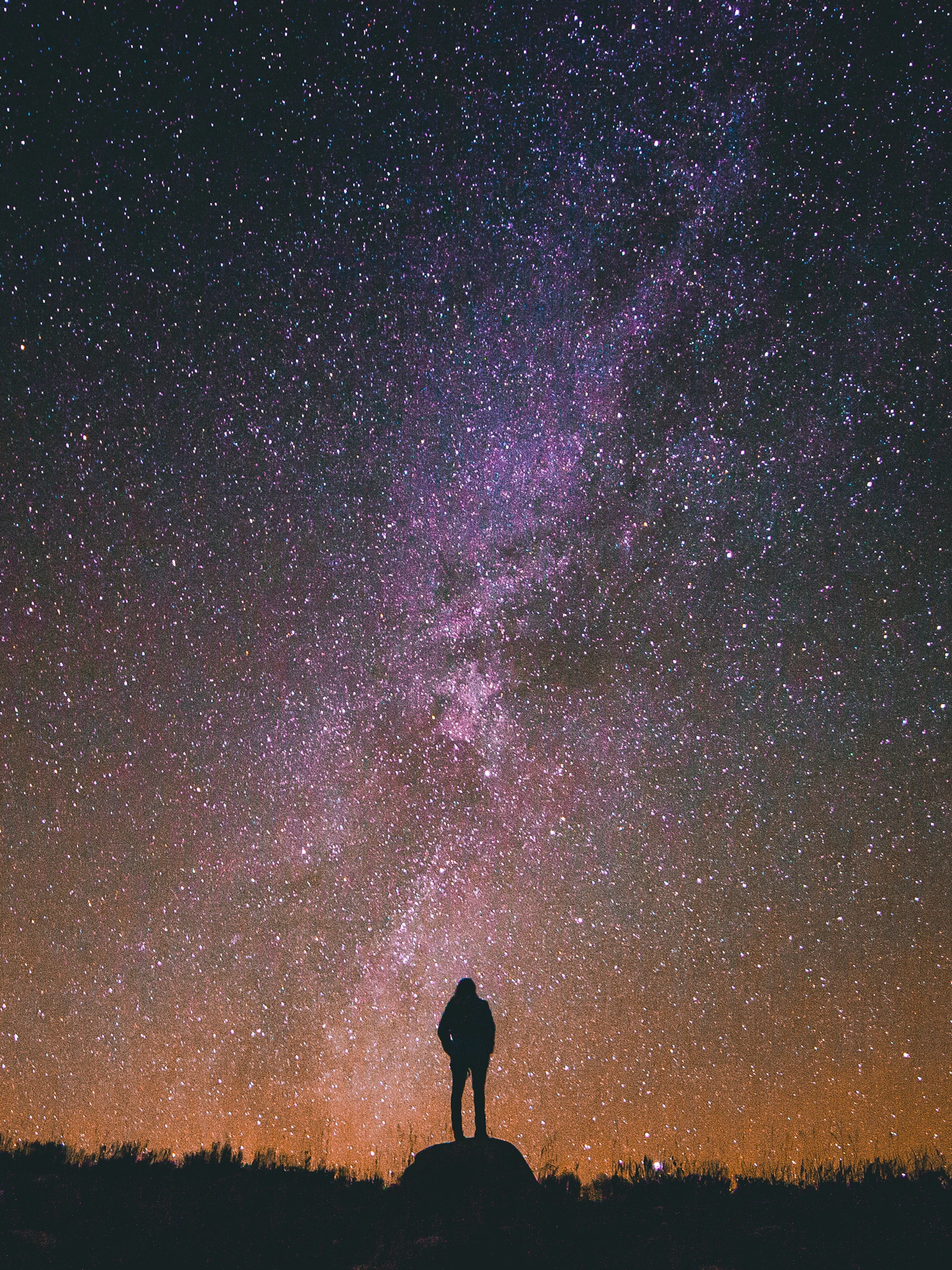 Kosmische spiritualiteit Foto door Greg Rakozy (via Unsplash)