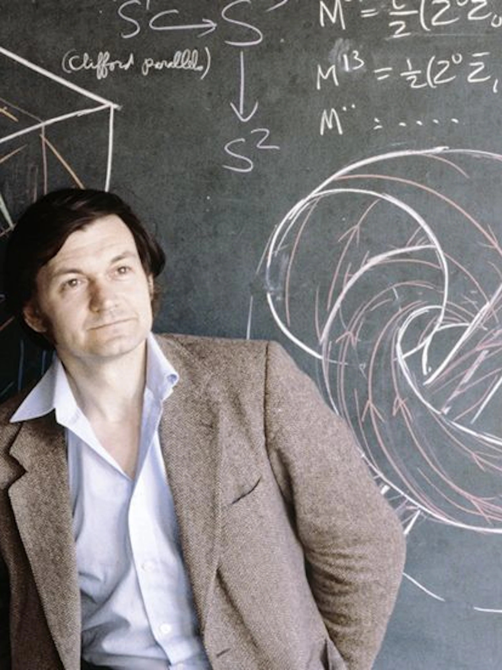 De jonge Penrose (©Anthony Howarth) De jonge Penrose poseert naast een topologisch krijtuniversum (©Anthony Howarth)