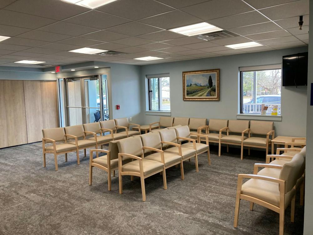 Large patient waiting room with rows of chairs at Princeton Eye Group’s new Somerset office