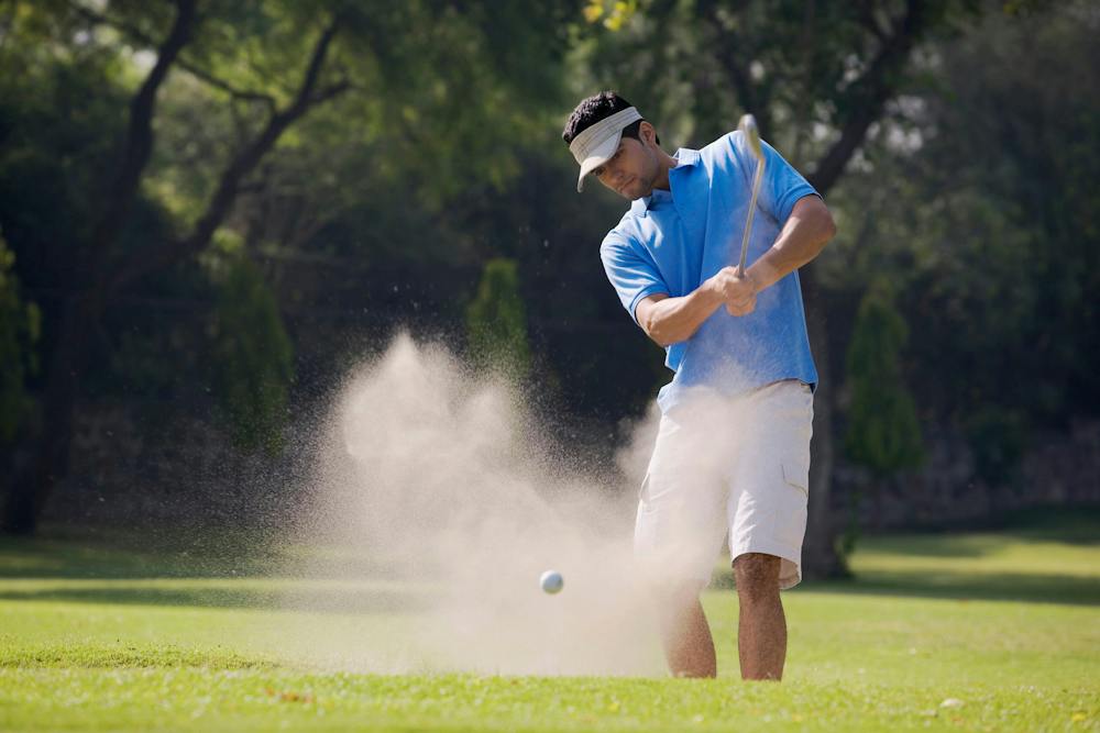 man golfing