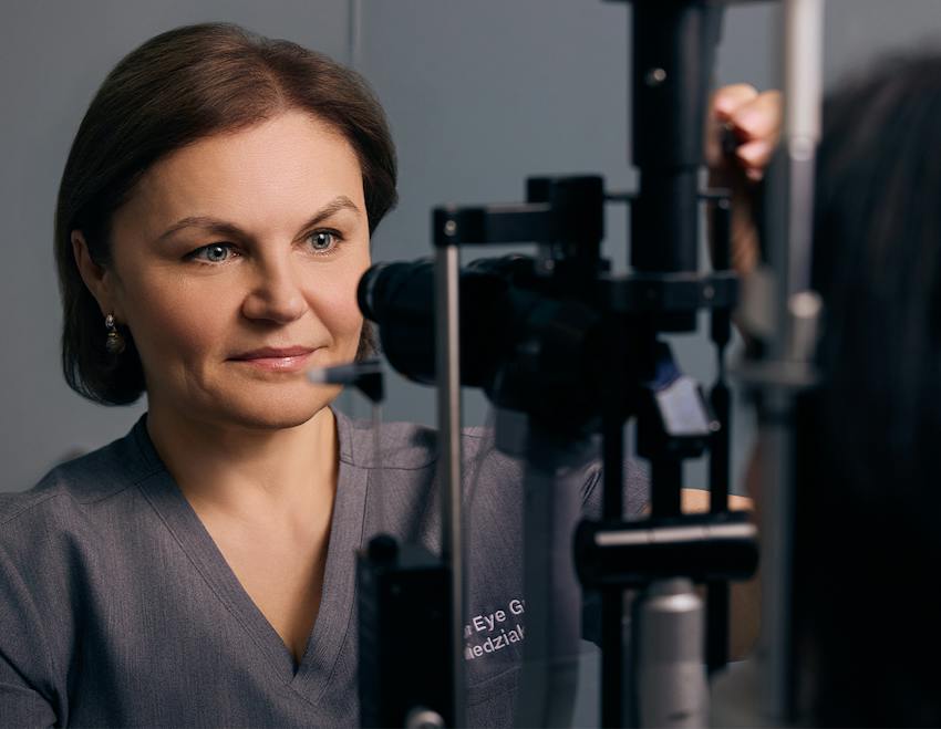 Doctor working with eye equipment