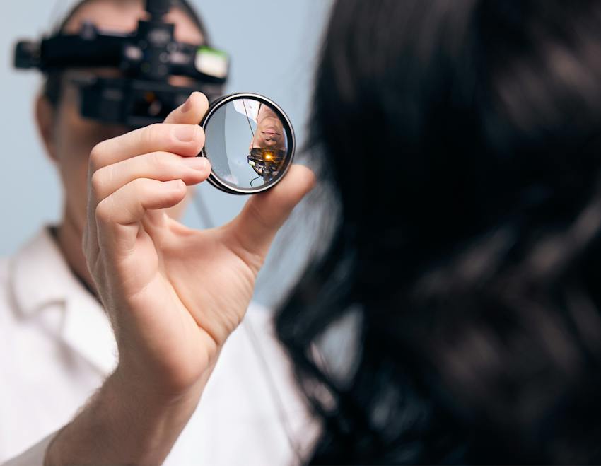 doctor examining a patient's eye
