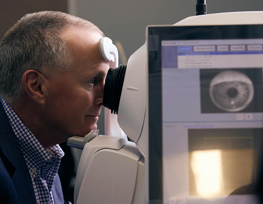 man getting his eyes checked