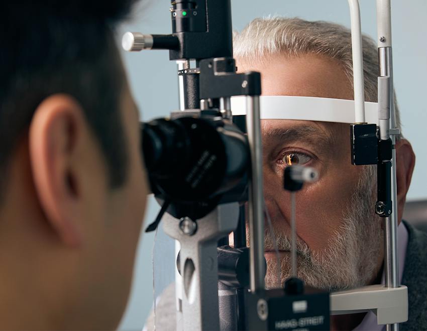doctor examing a patient's eyes