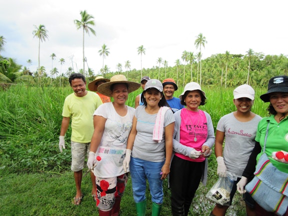 TdH NL empowered women’s group in the Cagpile community in Oras plant trees with help from funds from the Department of Environment and Natural Resources (DENR)