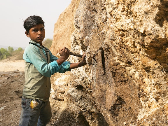 Young boy working in the Mica industry