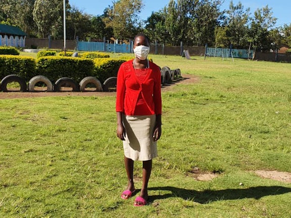 Young girl wearing a face mask for protection for COVID 19