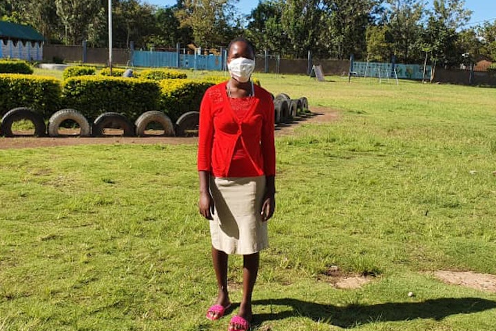 Young girl wearing a face mask for protection for COVID 19