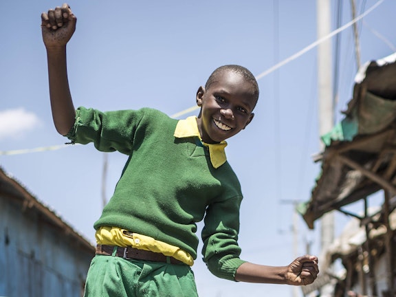 Schoolboy in informal settlement Nairobi (Kenya)