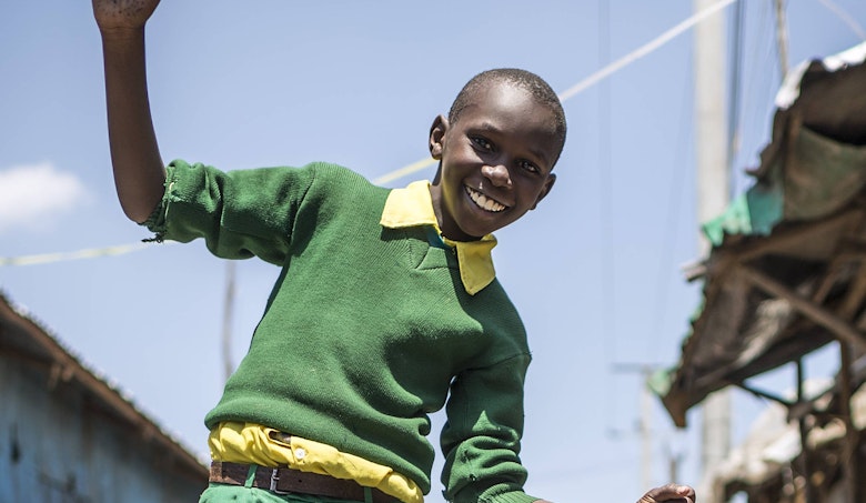 Schoolboy in informal settlement Nairobi (Kenya)