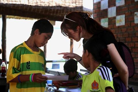 Zoe, talking to children in Siem Reap