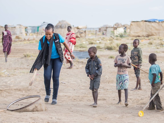 Jesca Edung Lomongin playing with children in Turkana, Kenya