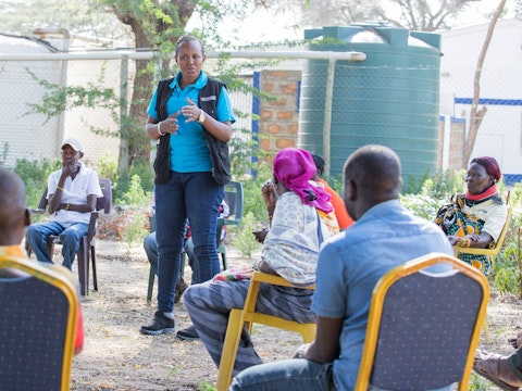 Jesca Edung Lomongin giving a training to the local Child Protection Committee in Lokichar, Kenya