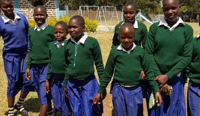 Rhobi and her fellow pupils in school in Masanga, Tanzania