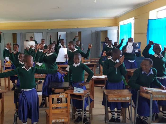 Rhobi with her class mates during the lesson