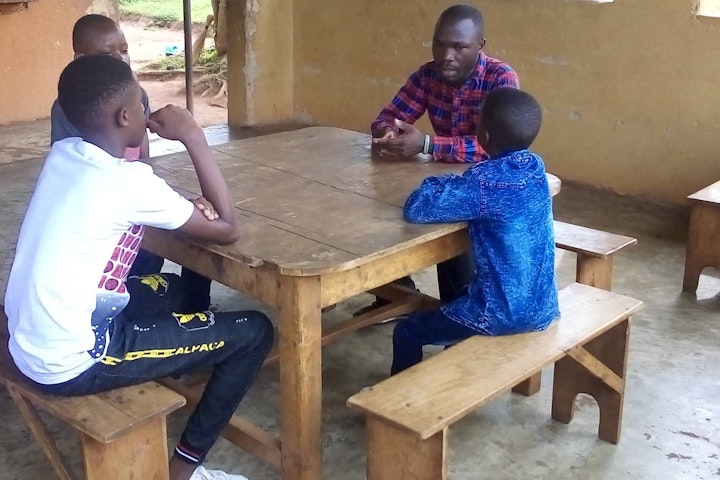 ugct0335-dp-2021q1-peter-and-his-brothers-during-a-counselling-session.jpg