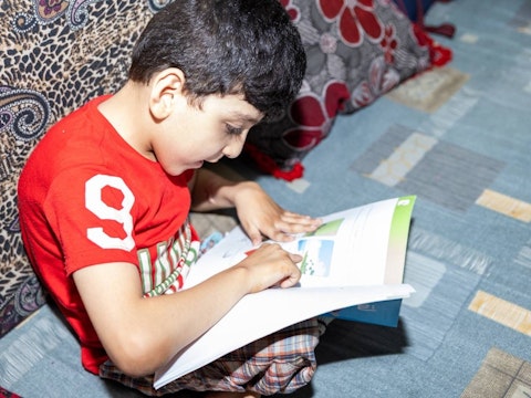 Louay studying at home