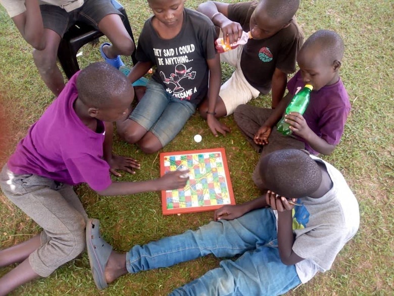 George playing with his friends