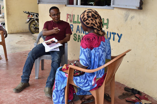 Participant, Rehema, talking to the Kesho Kenya M&E Officer at the training institution where she is studying. Photo credit: Kesho Kenya