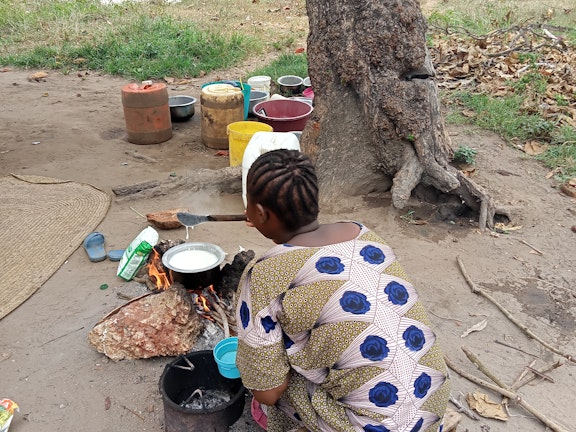 Participant, Jane, cooking at home. Photo credit: Kesho Kenya