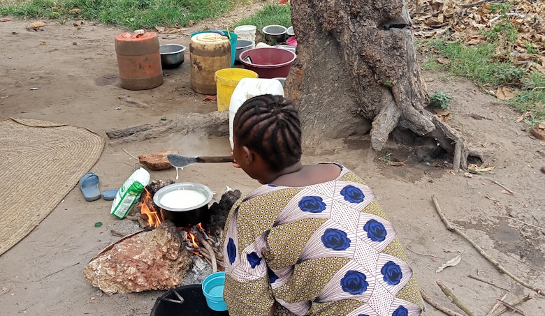 Participant, Jane, cooking at home. Photo credit: Kesho Kenya