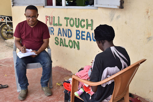 Participant, Carol, talking to the Kesho Kenya M&E Officer at the training institution where she is studying. Photo credit: Kesho Kenya