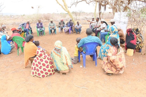 Project team engaging with community members