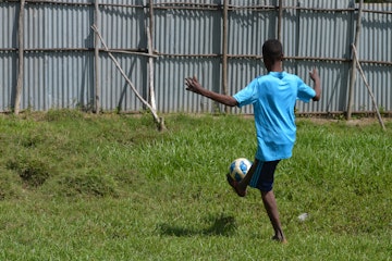 Solomon playing football