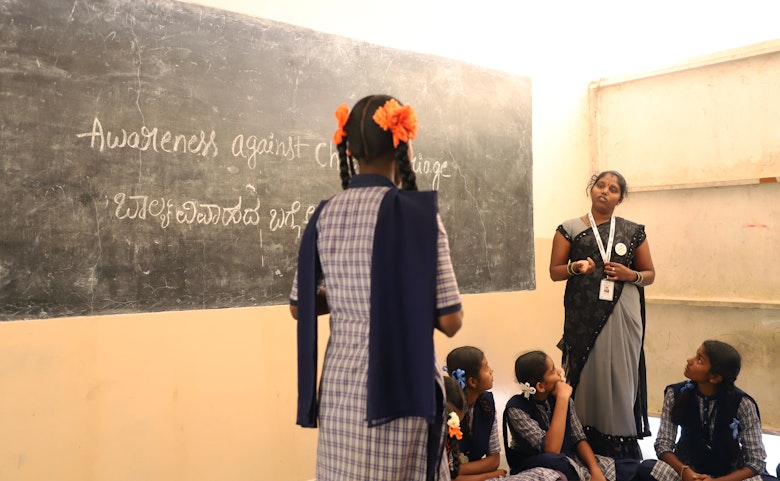 Roopa spreading awareness in schools