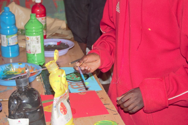 Kaunda at an art session in an art hub in Majengo